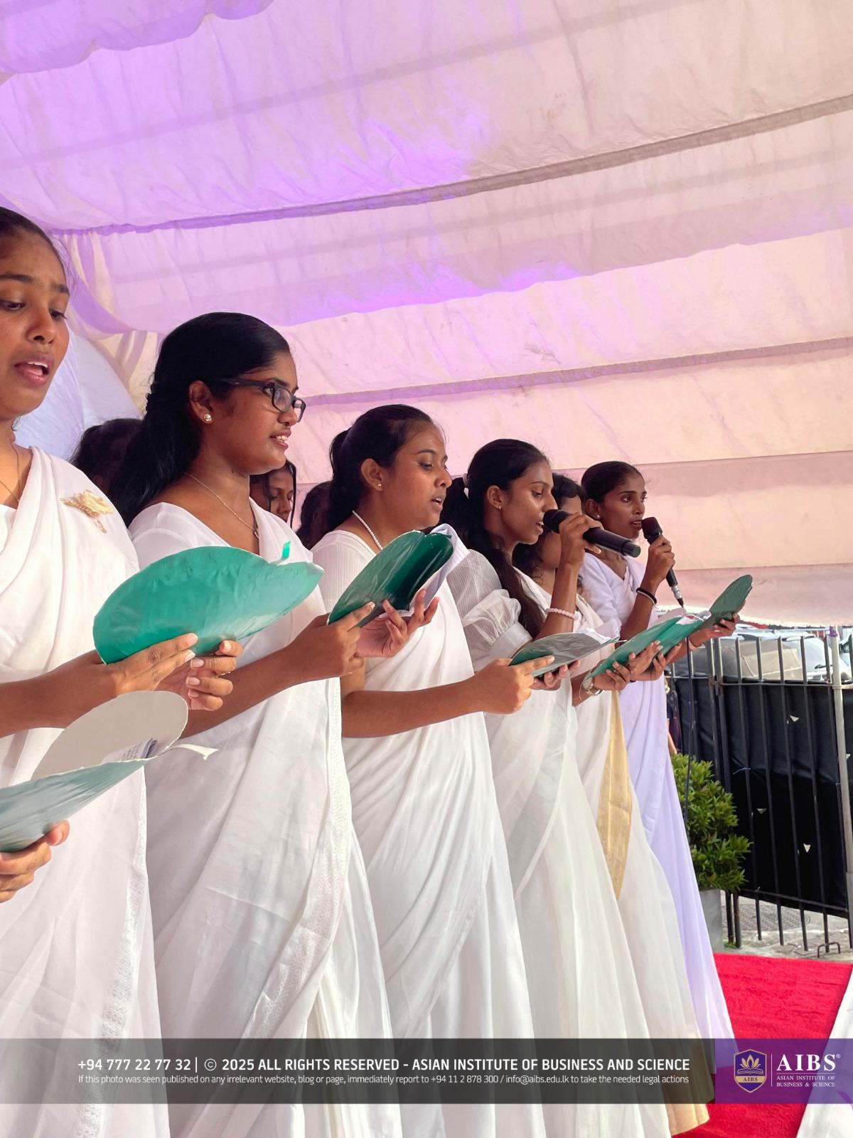 A Night of Light and Giving: Poson Celebrations at AIBS