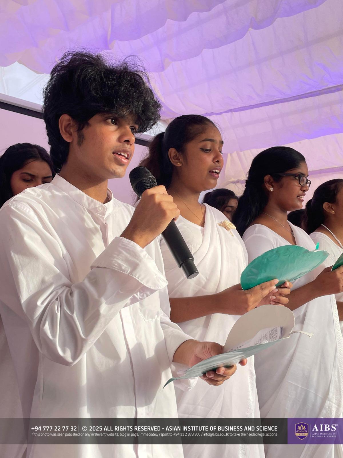 A Night of Light and Giving: Poson Celebrations at AIBS
