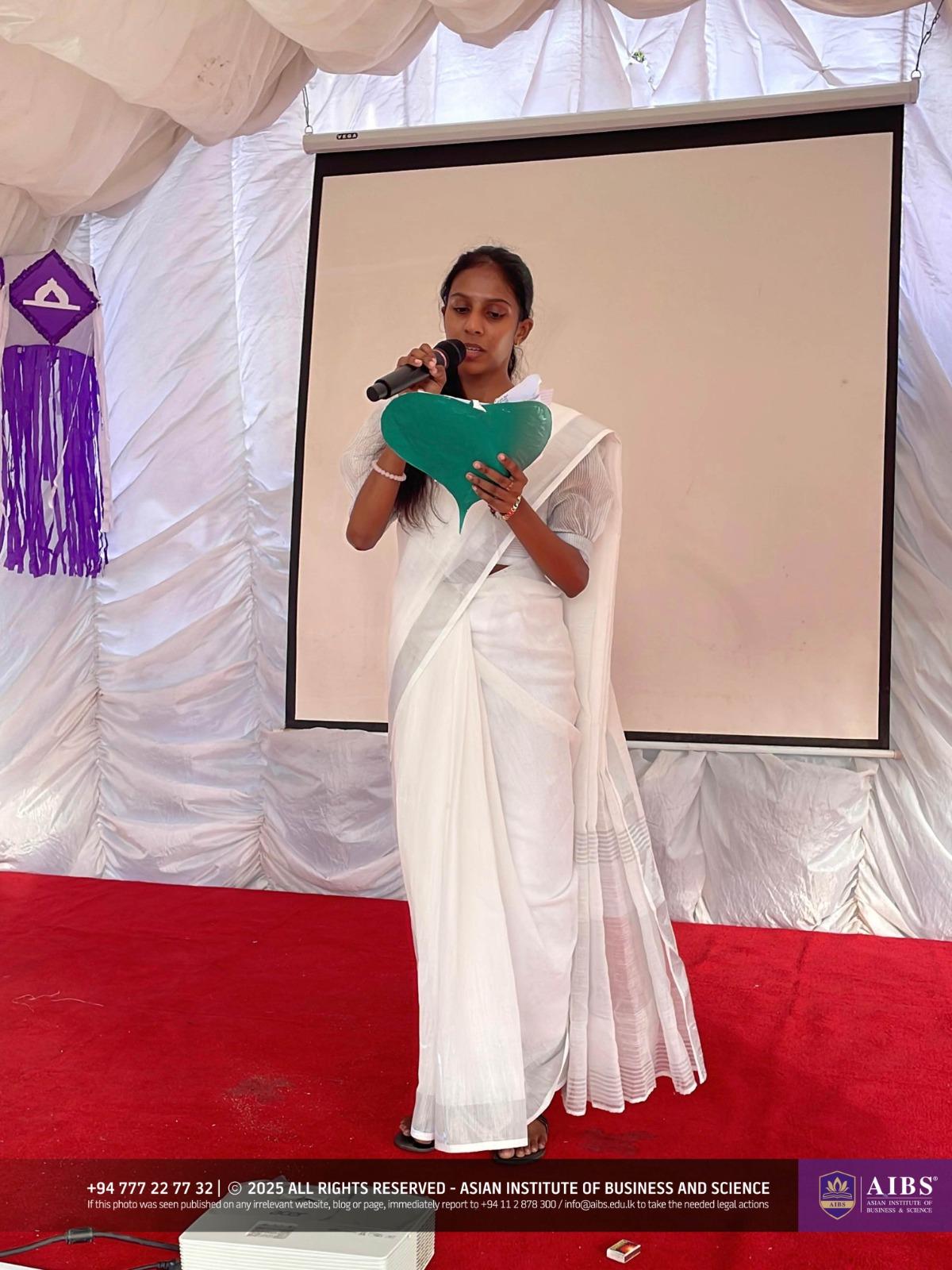 A Night of Light and Giving: Poson Celebrations at AIBS