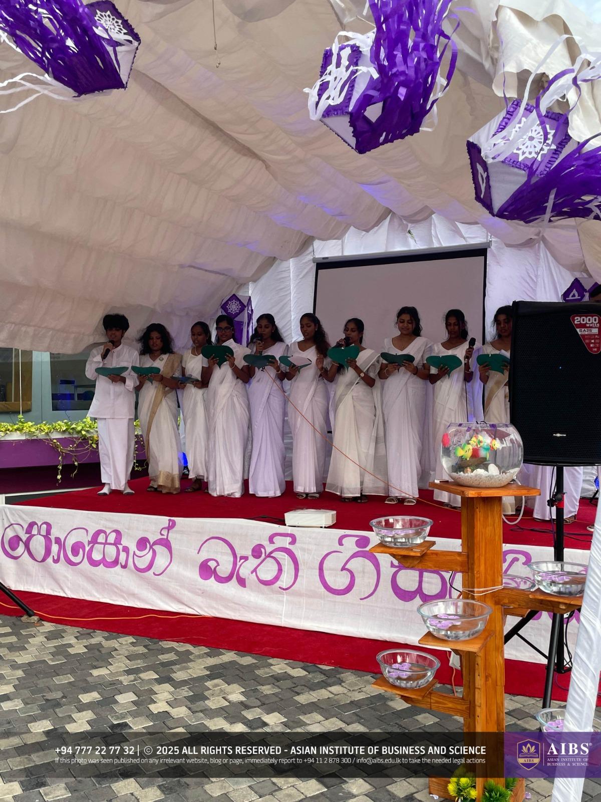 A Night of Light and Giving: Poson Celebrations at AIBS