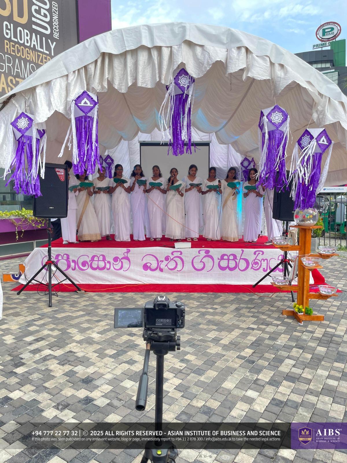 A Night of Light and Giving: Poson Celebrations at AIBS