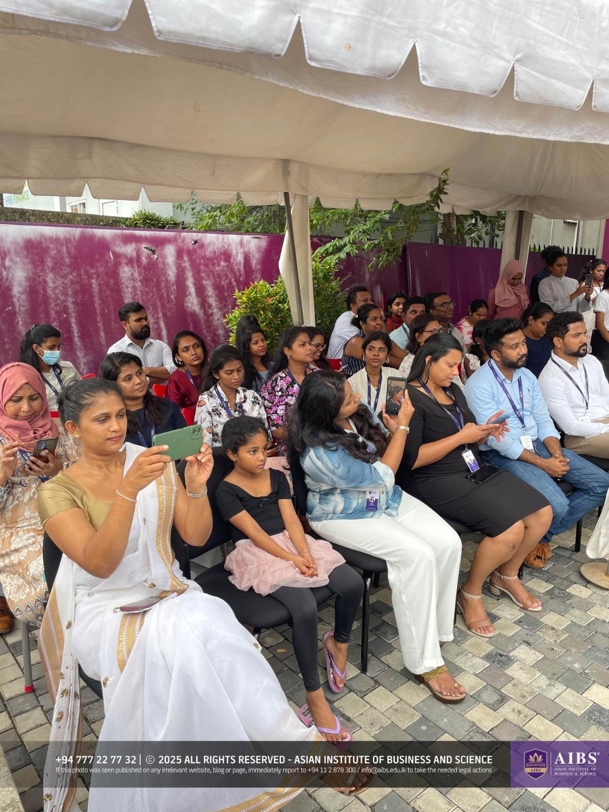 A Night of Light and Giving: Poson Celebrations at AIBS