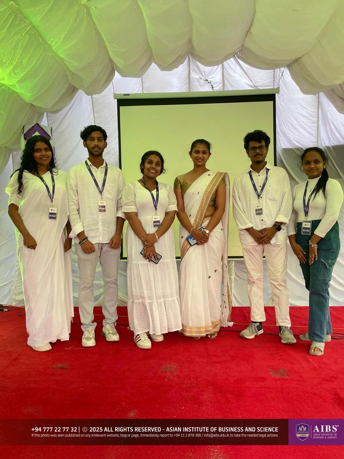 A Night of Light and Giving: Poson Celebrations at AIBS