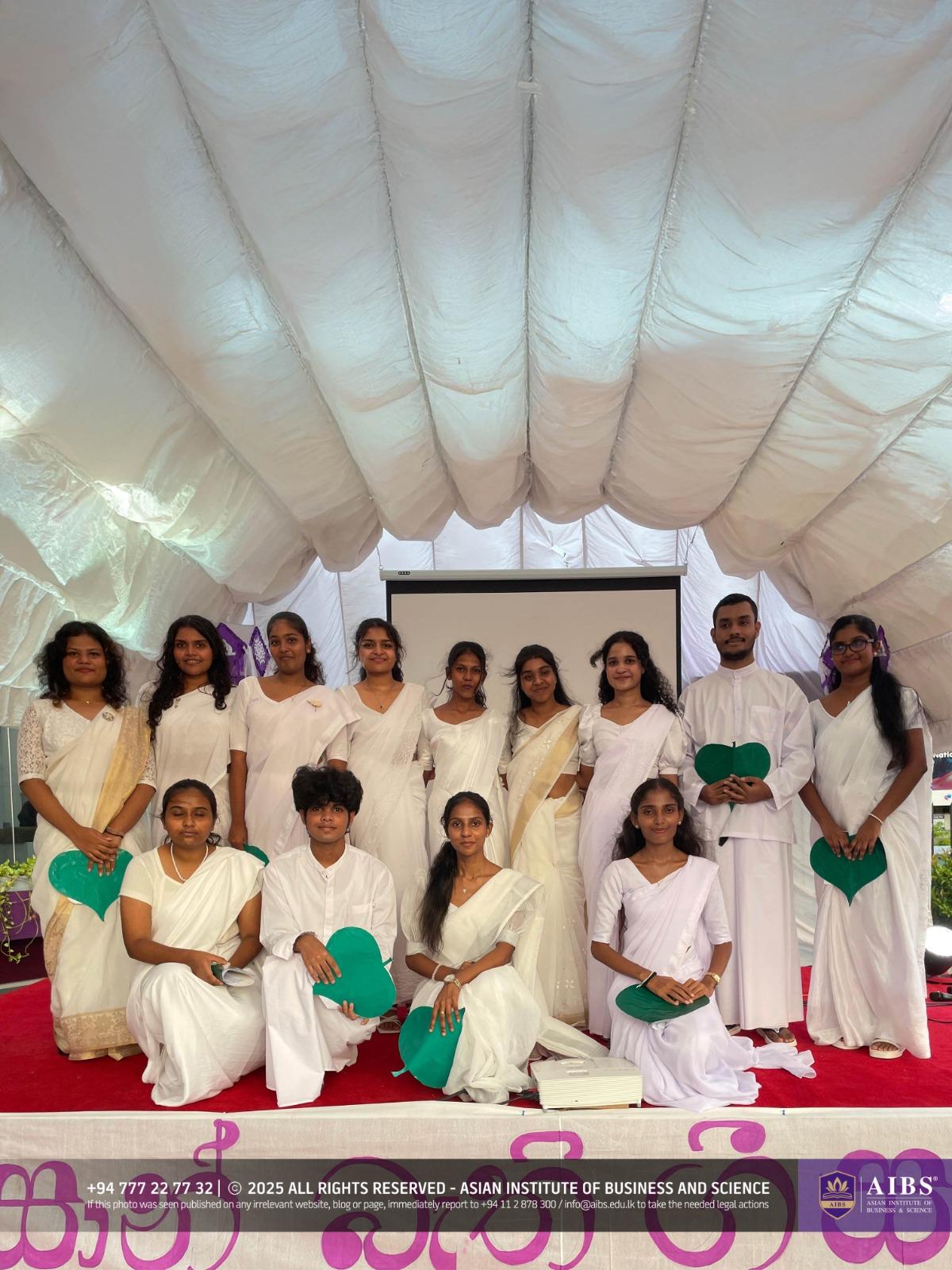 A Night of Light and Giving: Poson Celebrations at AIBS