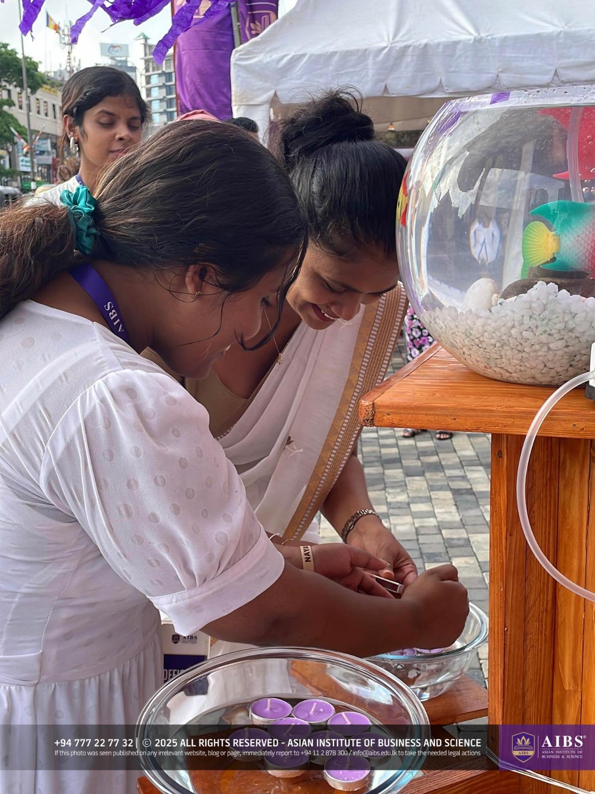 A Night of Light and Giving: Poson Celebrations at AIBS