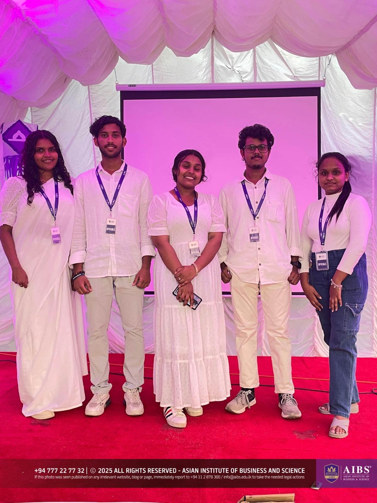 A Night of Light and Giving: Poson Celebrations at AIBS
