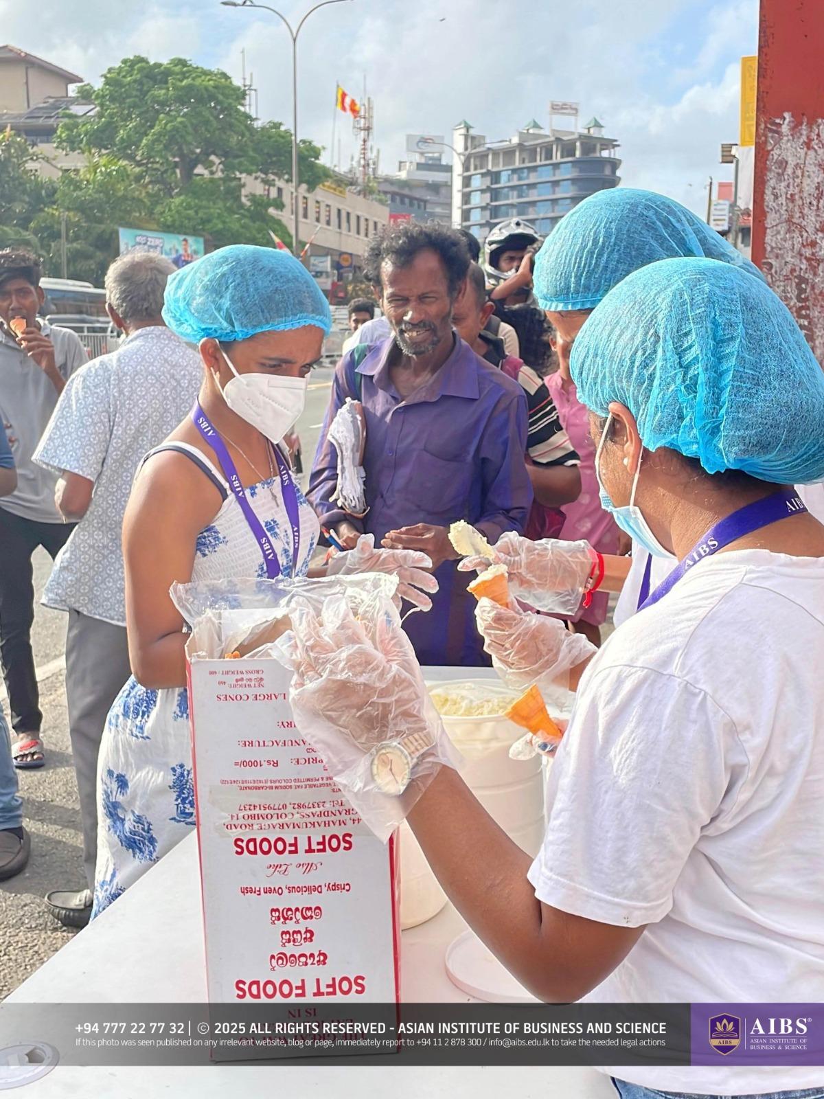 A Night of Light and Giving: Poson Celebrations at AIBS