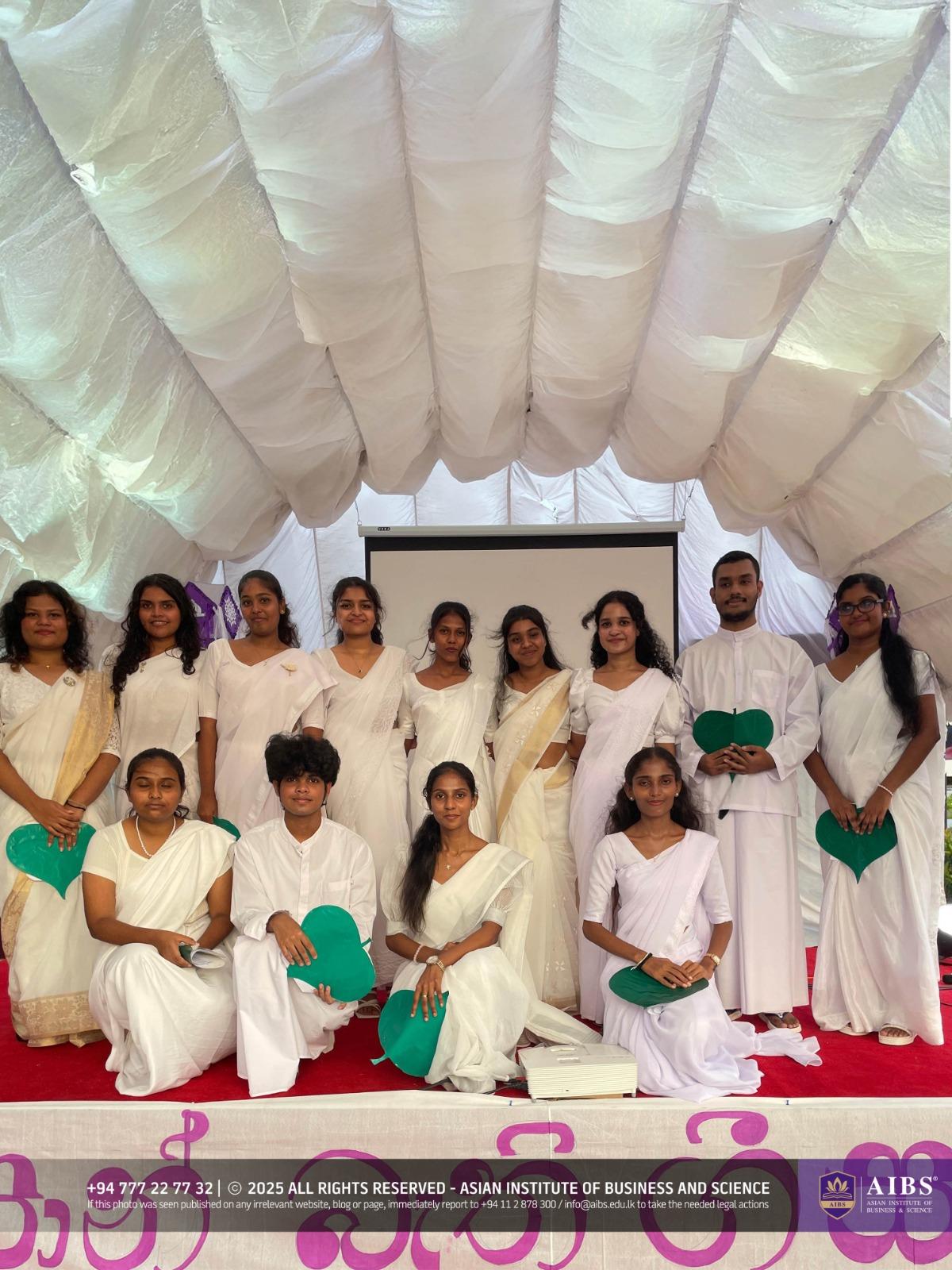 A Night of Light and Giving: Poson Celebrations at AIBS