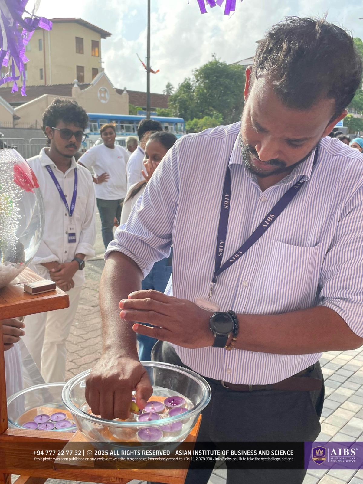 A Night of Light and Giving: Poson Celebrations at AIBS