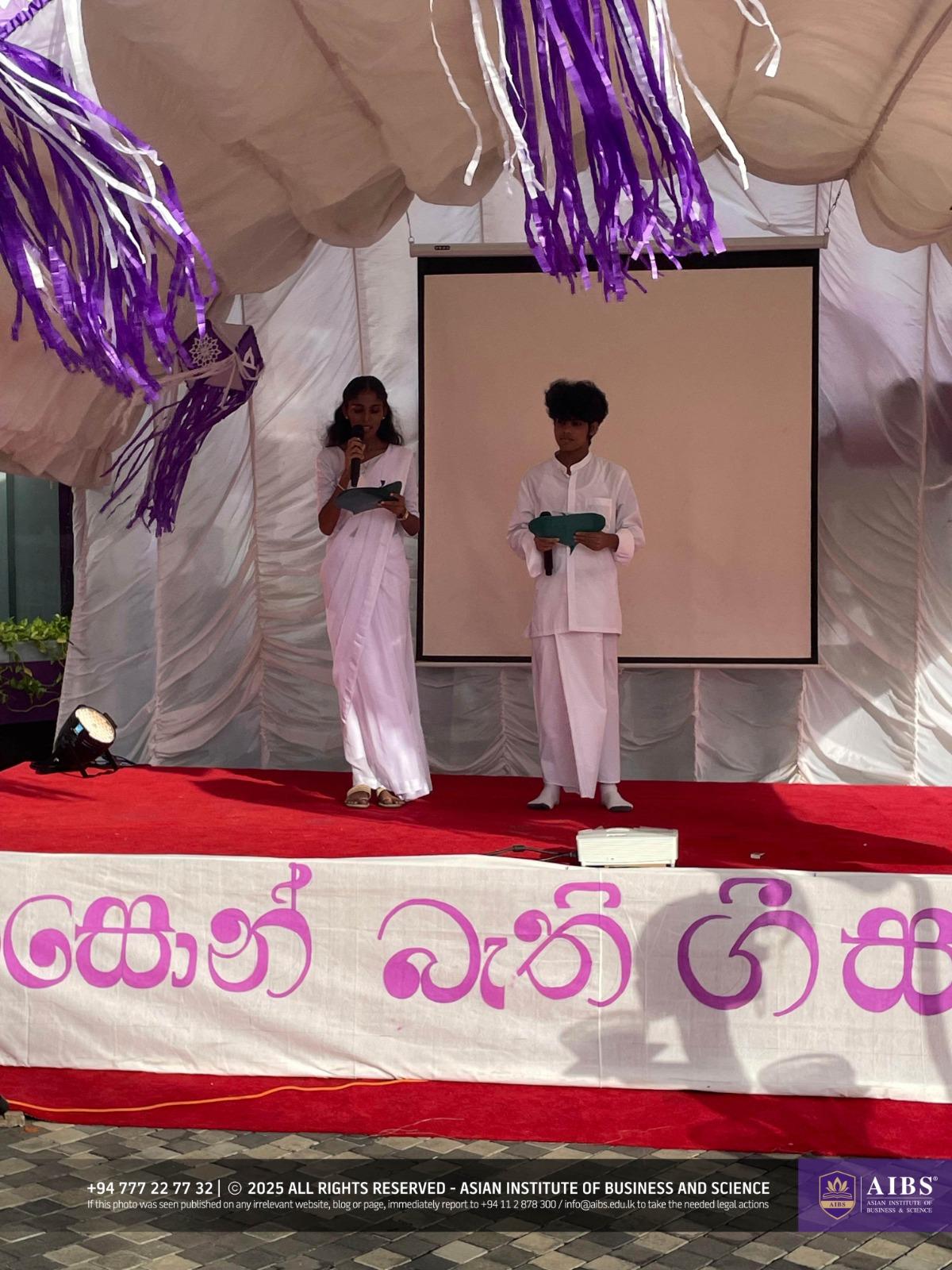 A Night of Light and Giving: Poson Celebrations at AIBS