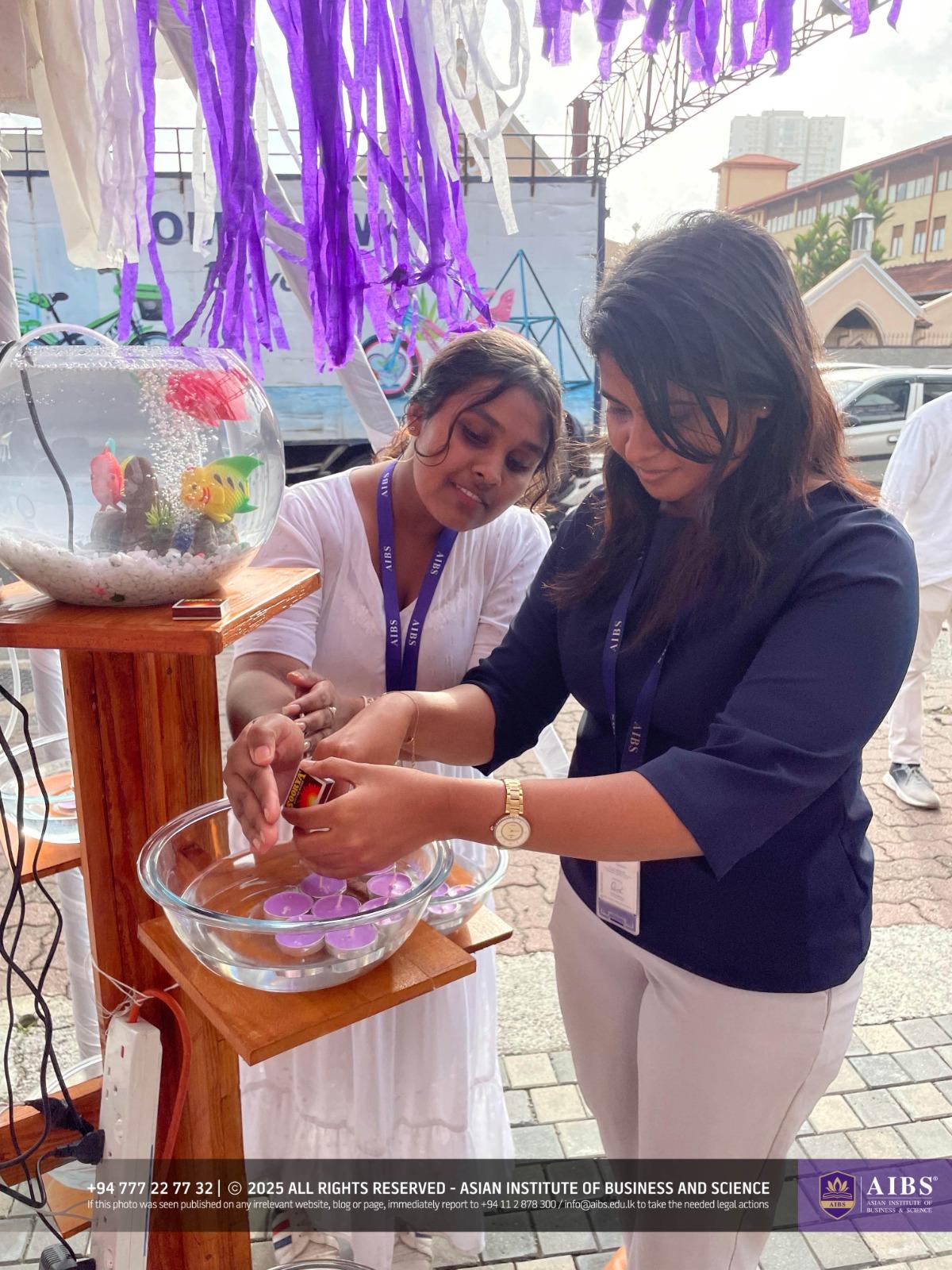 A Night of Light and Giving: Poson Celebrations at AIBS
