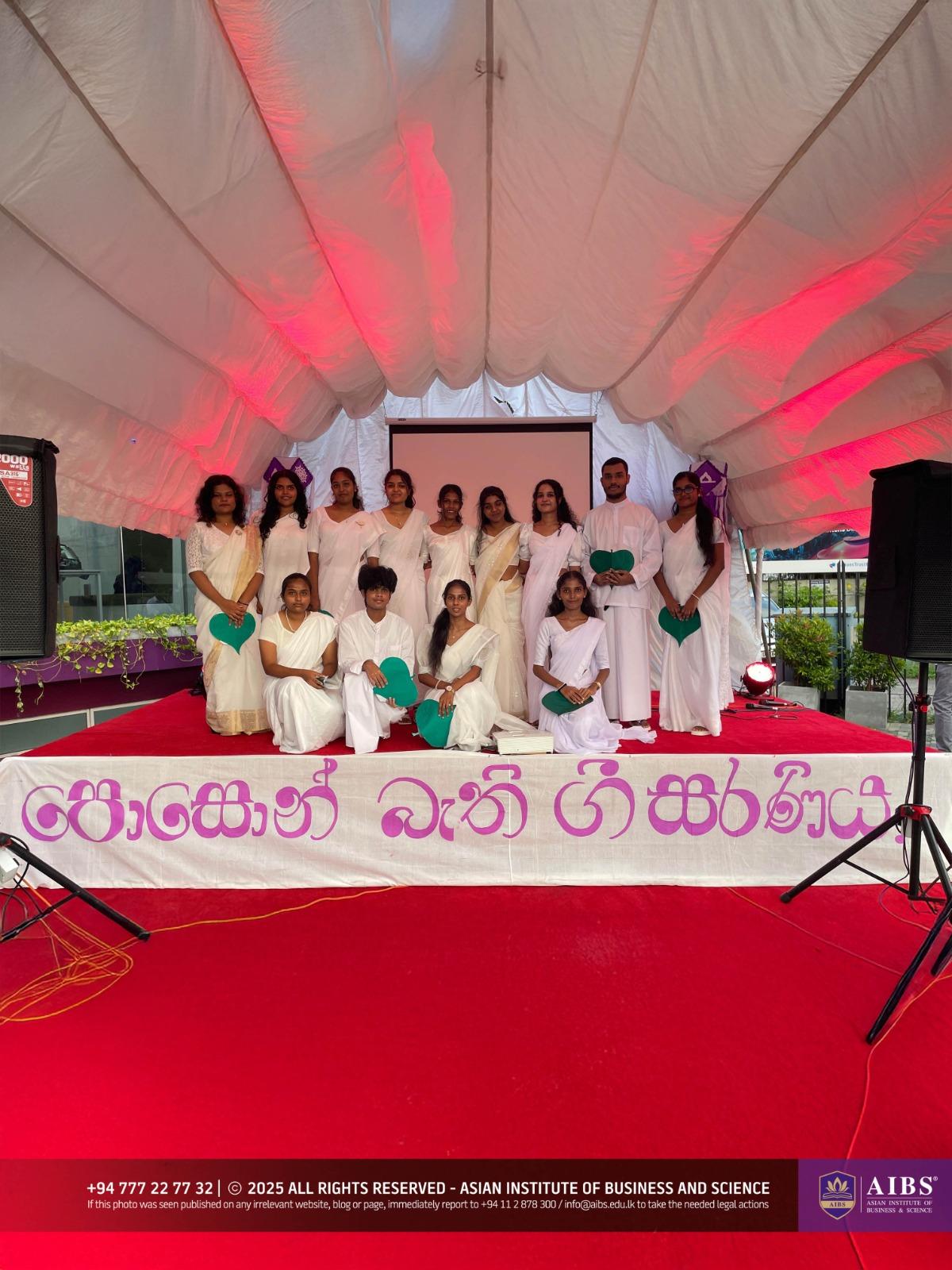 A Night of Light and Giving: Poson Celebrations at AIBS
