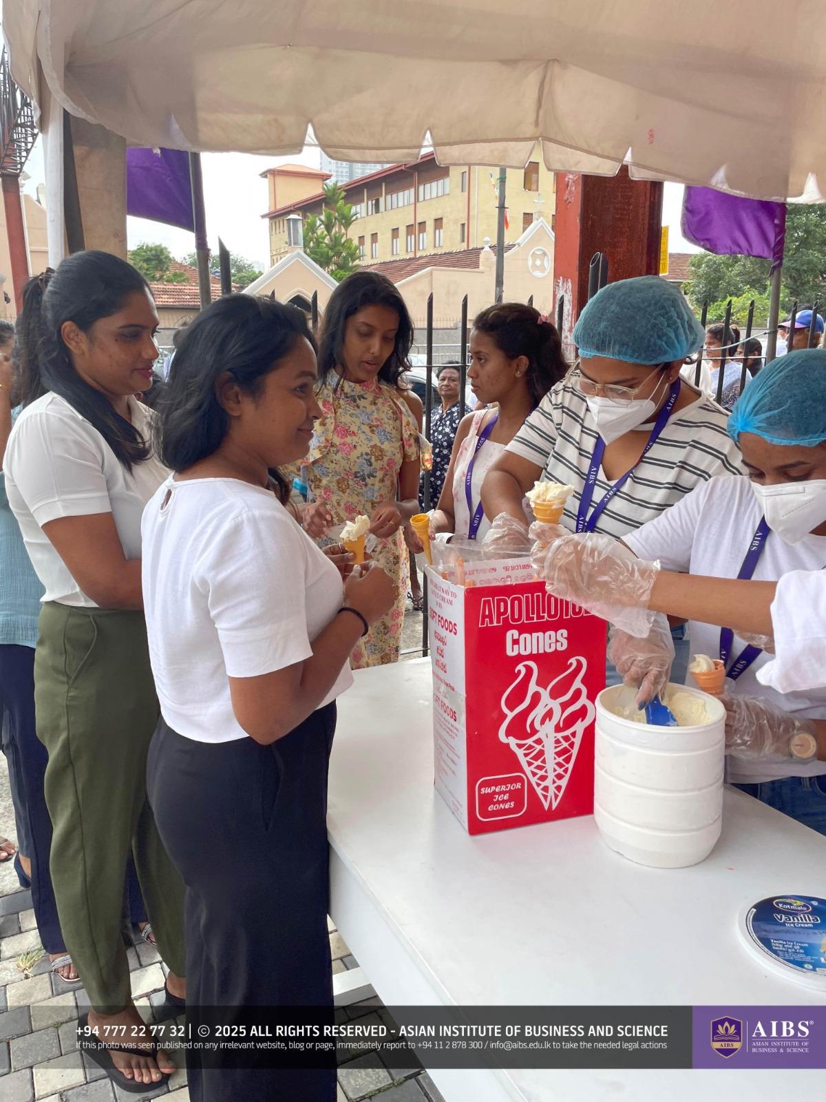A Night of Light and Giving: Poson Celebrations at AIBS